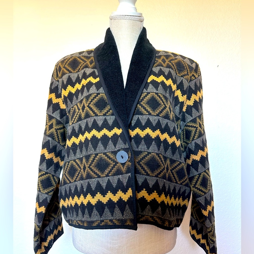 VINTAGE New Identity crop jacket.